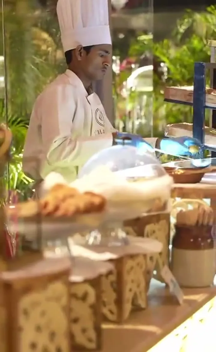 Chef working a live counter — event by Plan With YOLO, Pune