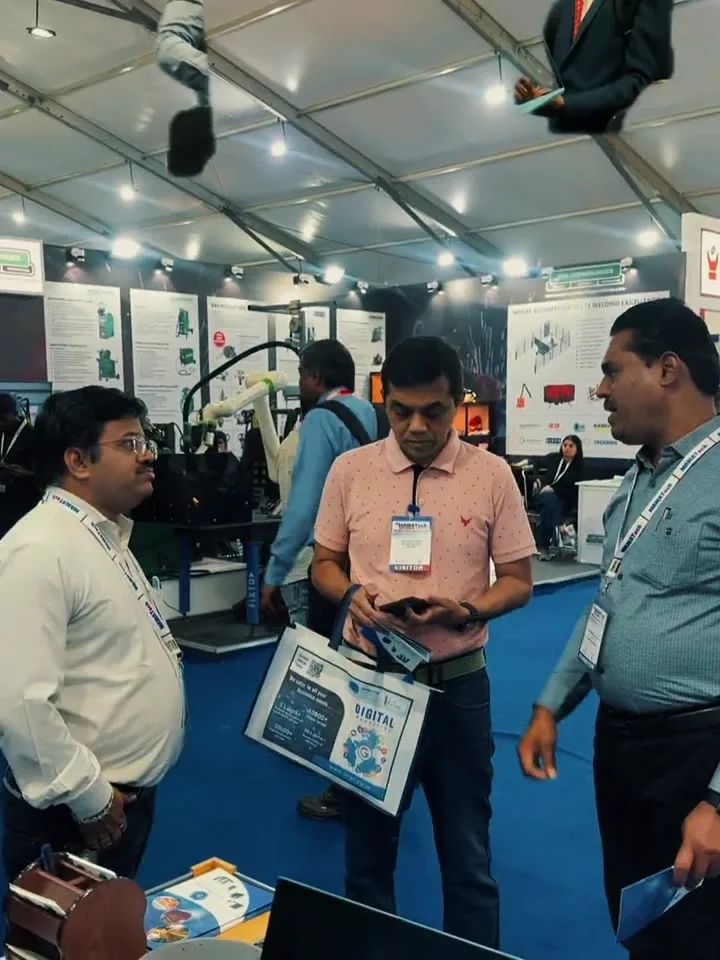 Visitors at the stall on the show floor — event by Plan With YOLO, Pune
