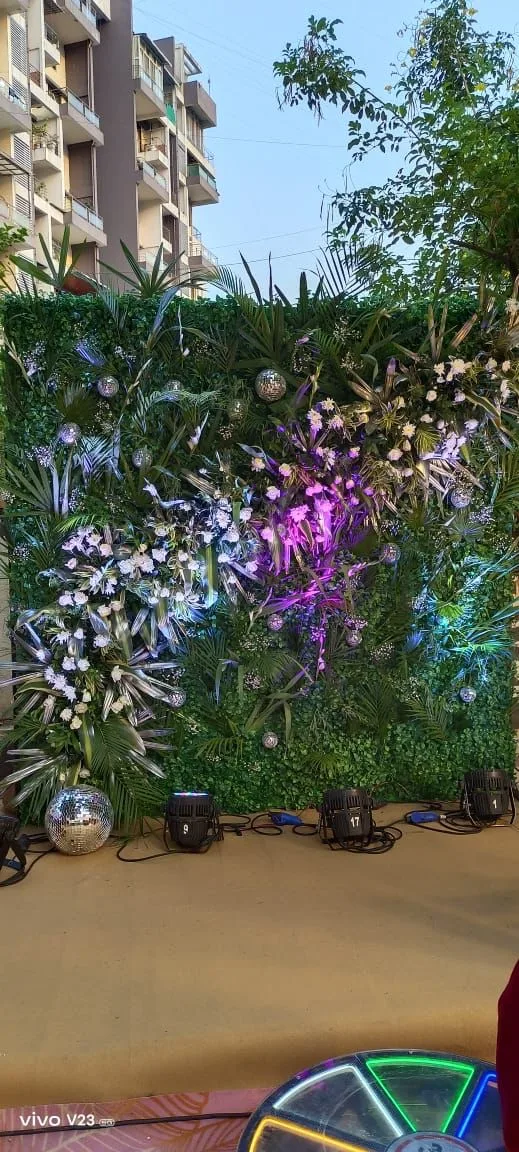 Floral backdrop set outdoors — event by Plan With YOLO, Pune