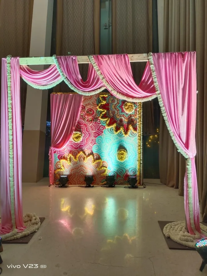 Draped medallion backdrop for a festival evening — event by Plan With YOLO, Pune