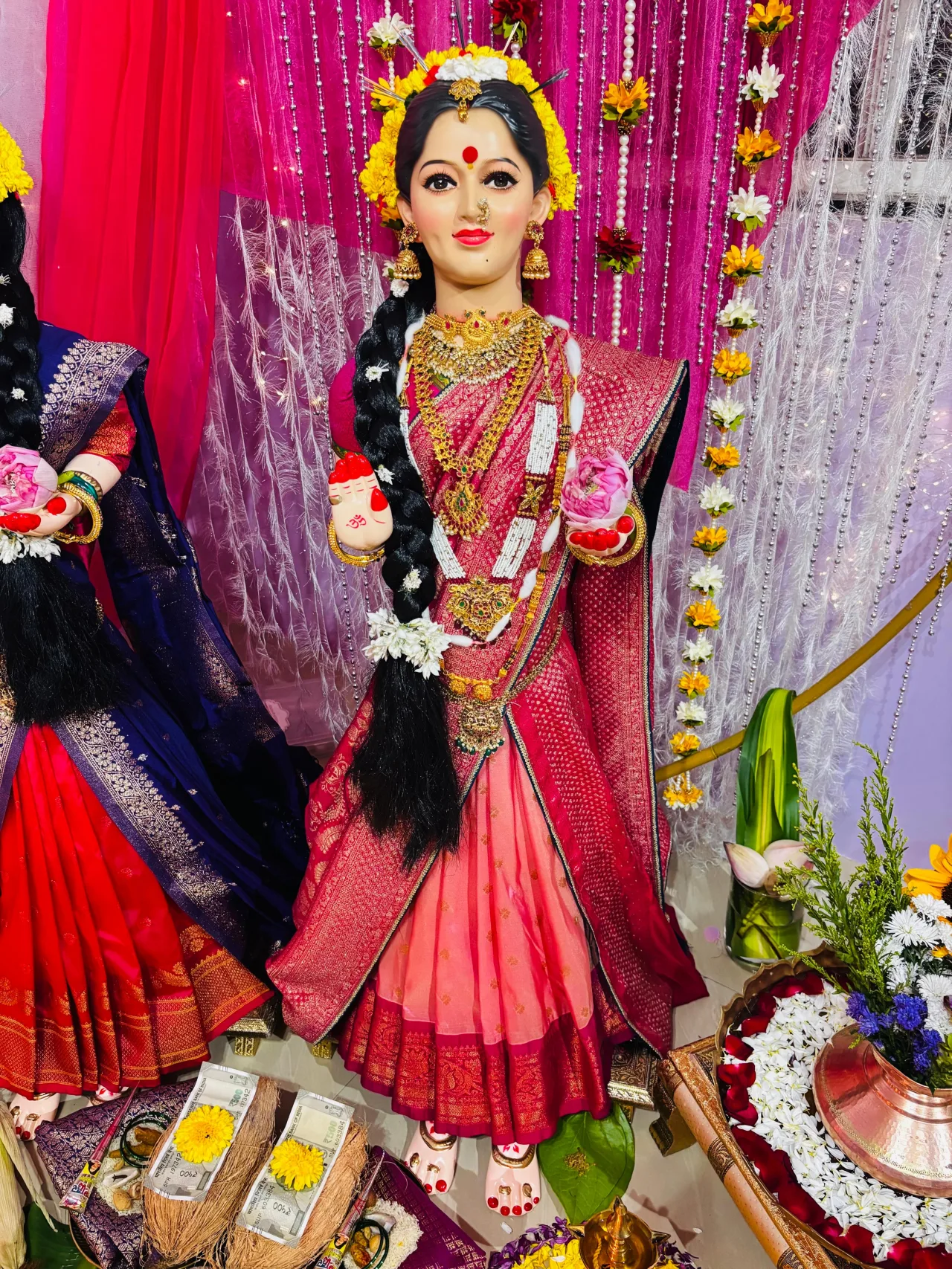 Gauri idols dressed and garlanded — event by Plan With YOLO, Pune