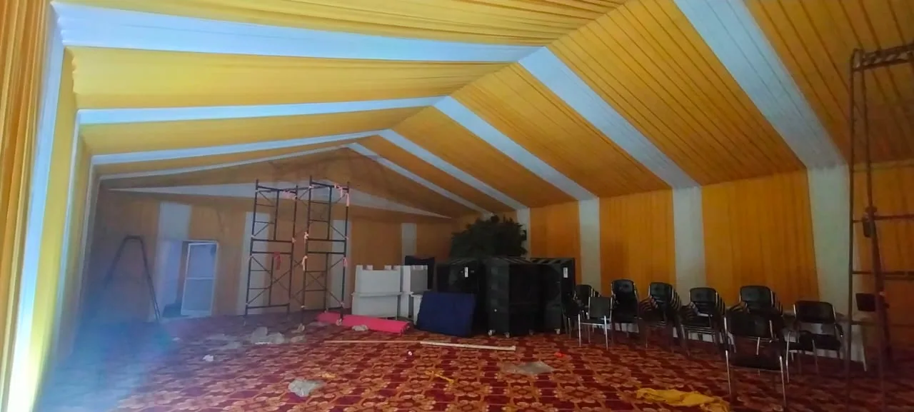 Hangar tent interior draped — event by Plan With YOLO, Pune