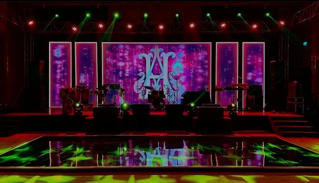 Led stage monogram dancefloor — event by Plan With YOLO, Pune