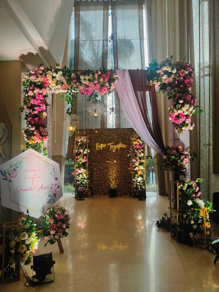 Floral arch with a welcome board — event by Plan With YOLO, Pune
