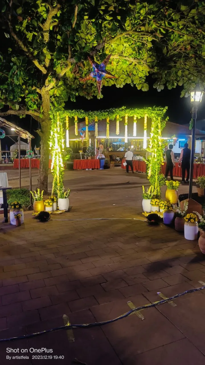 Draped entrance with greenery — event by Plan With YOLO, Pune