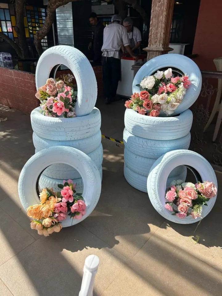 Painted tyres and flowers as a photo corner — event by Plan With YOLO, Pune