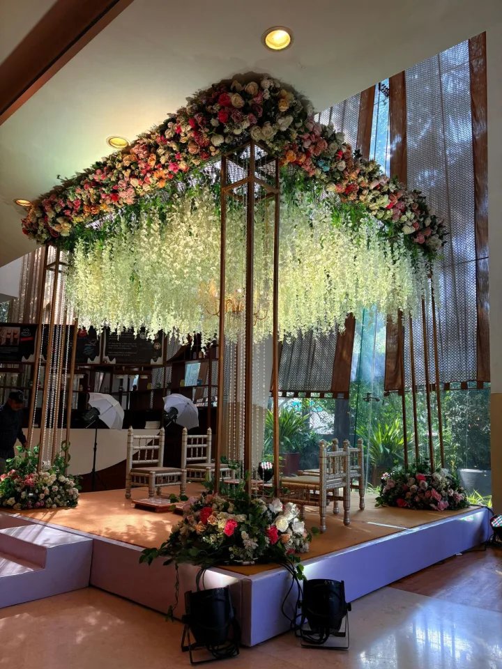 Hanging floral canopy — event by Plan With YOLO, Pune