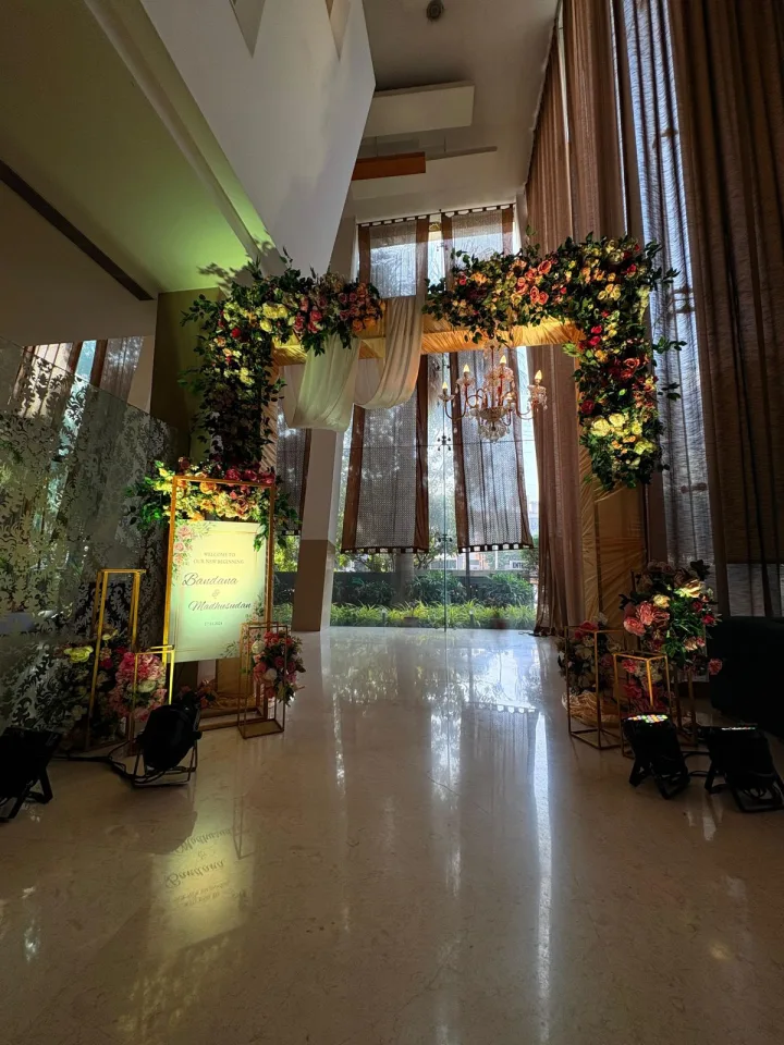Entrance arch inside the venue — event by Plan With YOLO, Pune