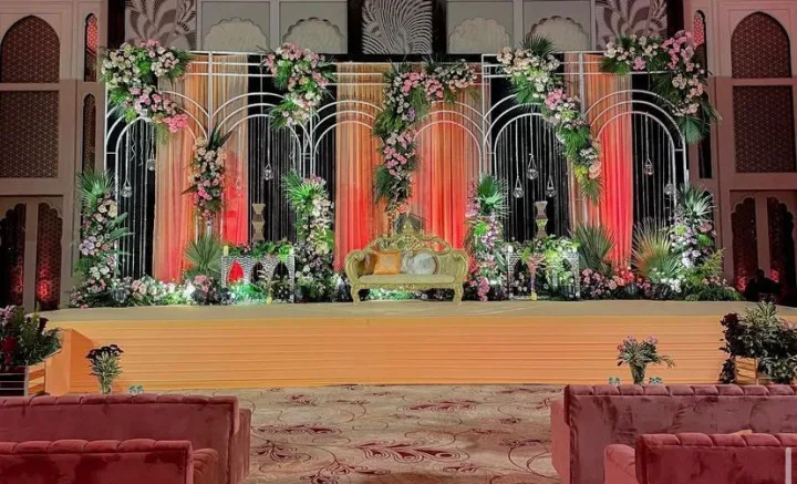 Wedding stage in pink and gold — event by Plan With YOLO, Pune