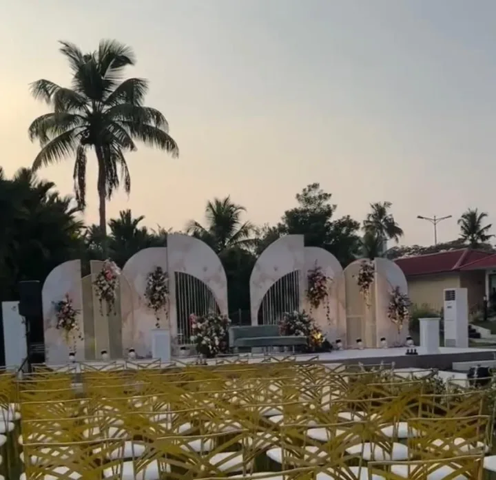 White arches set out on a lawn — event by Plan With YOLO, Pune