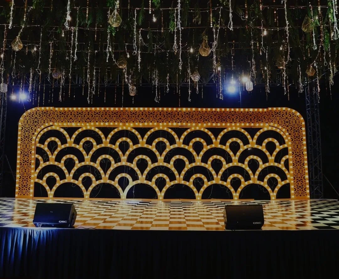 Floral arch on a walkway at night — event by Plan With YOLO, Pune